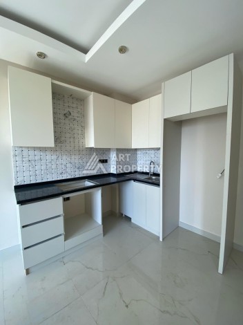 Новая квартира 1+1 на улице Барбароса в Махмутларе, вторая линия от моря - Ракурс 10