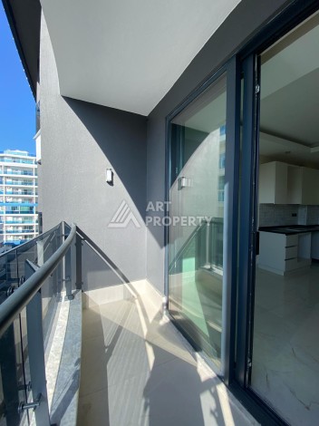 Новая квартира 1+1 на улице Барбароса в Махмутларе, вторая линия от моря - Ракурс 11