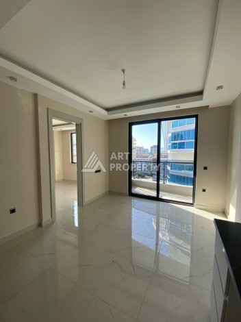 Новая квартира 1+1 на улице Барбароса в Махмутларе, вторая линия от моря - Ракурс 14