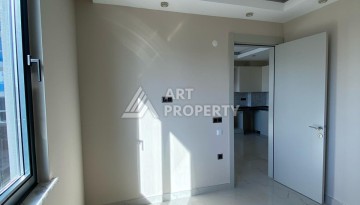 Новая квартира 1+1 на улице Барбароса в Махмутларе, вторая линия от моря - Ракурс 19