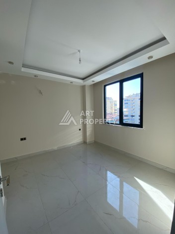 Новая квартира 1+1 на улице Барбароса в Махмутларе, вторая линия от моря - Ракурс 19