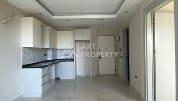 Новая квартира 1+1 на улице Барбароса в Махмутларе, вторая линия от моря - Ракурс 21