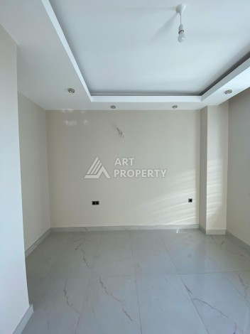 Новая квартира 1+1 на улице Барбароса в Махмутларе, вторая линия от моря - Ракурс 21