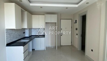 Новая квартира 1+1 на улице Барбароса в Махмутларе, вторая линия от моря - Ракурс 23