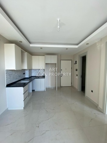 Новая квартира 1+1 на улице Барбароса в Махмутларе, вторая линия от моря - Ракурс 22