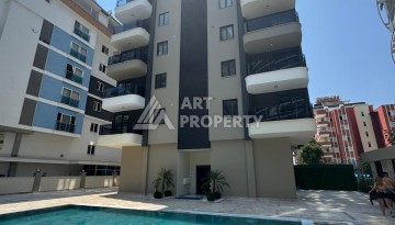 Новая квартира 1+1 на улице Барбароса в Махмутларе, вторая линия от моря - Ракурс 26