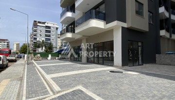 Новая квартира 1+1 на улице Барбароса в Махмутларе, вторая линия от моря - Ракурс 30