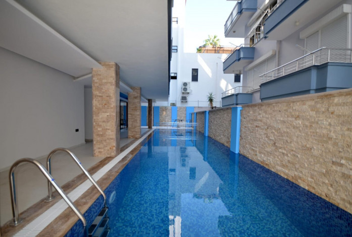 Двухкомнатная квартира в новом комплексе в курортном городе Алания, всего в 100 метрах от Средиземного моря, 65м2 - Ракурс 16