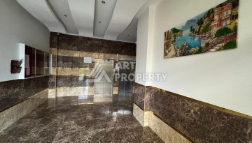 Просторная квартира 1+1 в центре Махмутлара рядом с Akdeniz Park - Ракурс 36