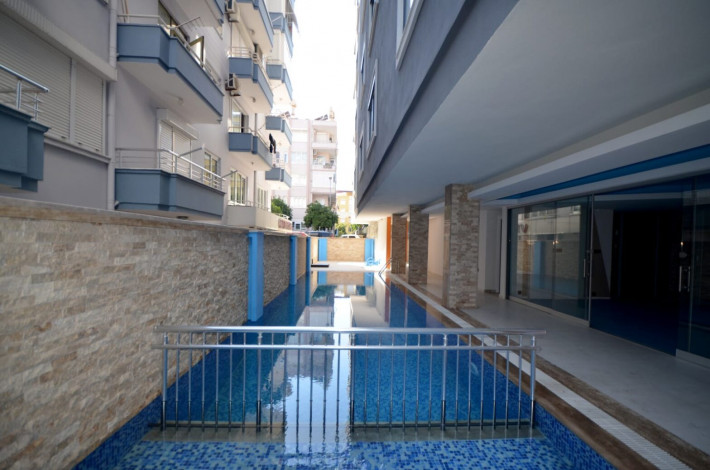 Двухкомнатная квартира в новом комплексе в курортном городе Алания, всего в 100 метрах от Средиземного моря, 65м2 - Ракурс 18