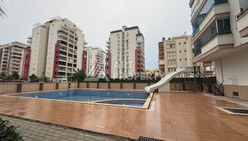 Просторная квартира 1+1 в центре Махмутлара рядом с Akdeniz Park - Ракурс 42