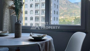 Недорогая квартира 1+1 в Махмутларе, 52 м², 600 м до моря - Ракурс 2