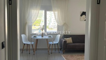Недорогая квартира 1+1 в Махмутларе, 52 м², 600 м до моря - Ракурс 3