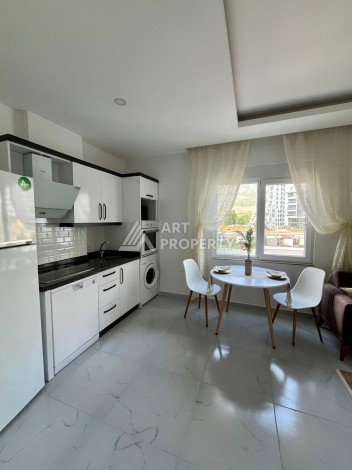 Недорогая квартира 1+1 в Махмутларе, 52 м², 600 м до моря - Ракурс 3