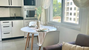 Недорогая квартира 1+1 в Махмутларе, 52 м², 600 м до моря - Ракурс 9