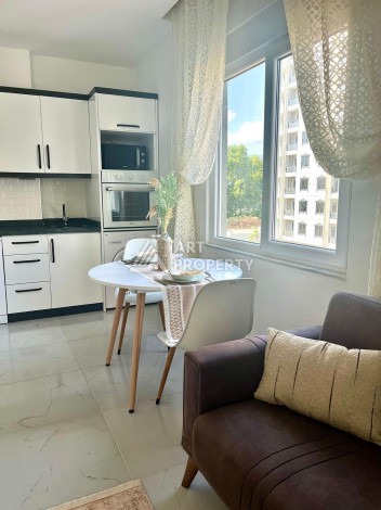 Недорогая квартира 1+1 в Махмутларе, 52 м², 600 м до моря - Ракурс 8