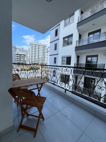 Недорогая квартира 1+1 в Махмутларе, 52 м², 600 м до моря - Ракурс 9