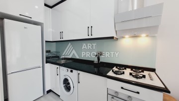Квартира 1+1 в Алании, 50 м², 700 м до моря, подходит под ВНЖ - Ракурс 2