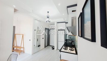 Квартира 1+1 в Алании, 50 м², 700 м до моря, подходит под ВНЖ - Ракурс 3