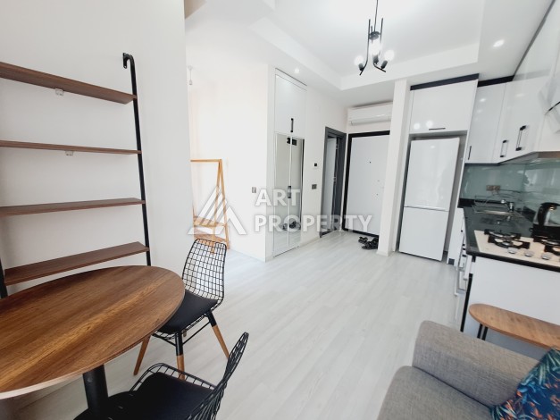 Квартира 1+1 в Алании, 50 м², 700 м до моря, подходит под ВНЖ - Ракурс 3