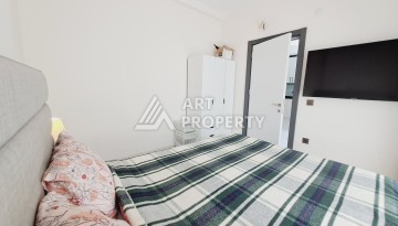 Квартира 1+1 в Алании, 50 м², 700 м до моря, подходит под ВНЖ - Ракурс 5