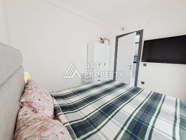 Квартира 1+1 в Алании, 50 м², 700 м до моря, подходит под ВНЖ - Ракурс 4