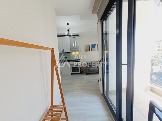 Квартира 1+1 в Алании, 50 м², 700 м до моря, подходит под ВНЖ - Ракурс 5