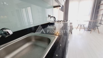 Квартира 1+1 в Алании, 50 м², 700 м до моря, подходит под ВНЖ - Ракурс 8