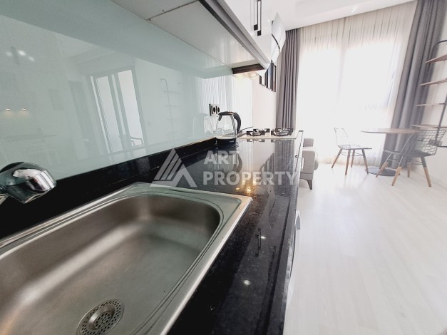 Квартира 1+1 в Алании, 50 м², 700 м до моря, подходит под ВНЖ - Ракурс 7