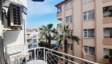 Недорогая квартира 2+1 в центре Алании, 100 м до моря, подходит под ВНЖ - Ракурс 18