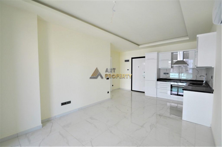 Новая квартира 1+1 в 350 метрах от пляжа Клеопатры в городе Аланья, 65 м2 - Ракурс 27