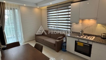 Меблированная квартира 1+1 в Алании, район Махмутлар, 350 метрах от моря. - Ракурс 1