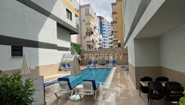 Меблированная квартира 1+1 в Алании, район Махмутлар, 350 метрах от моря. - Ракурс 9