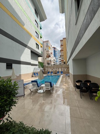 Меблированная квартира 1+1 в Алании, район Махмутлар, 350 метрах от моря. - Ракурс 8