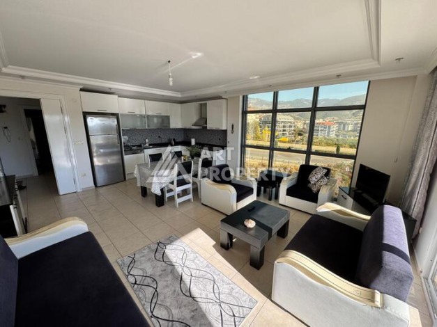 Квартира 1+1 с панорамными окнами в районе Оба, 75 м², подходит под ВНЖ - Ракурс 1