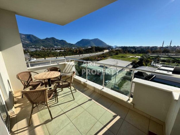 Квартира 1+1 с панорамными окнами в районе Оба, 75 м², подходит под ВНЖ - Ракурс 12