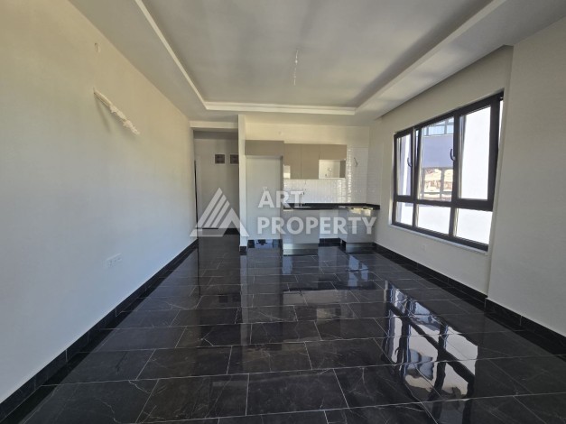 Квартира 1+1 с панорамным видом на горы в Махмутларе, 54 м², 600 м до моря - Ракурс 4