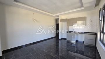 Квартира 1+1 с панорамным видом на горы в Махмутларе, 54 м², 600 м до моря - Ракурс 8