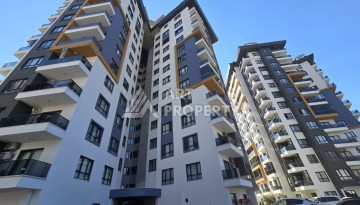 Квартира 1+1 с панорамным видом на горы в Махмутларе, 54 м², 600 м до моря - Ракурс 9