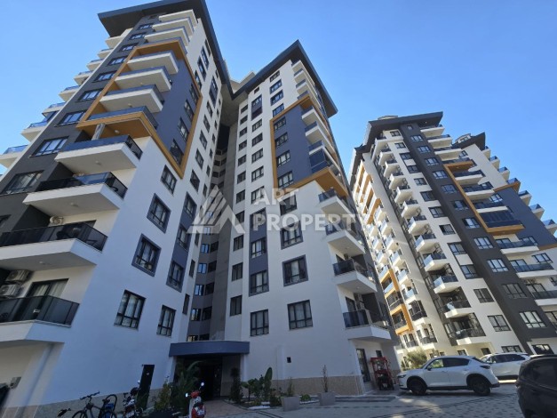 Квартира 1+1 с панорамным видом на горы в Махмутларе, 54 м², 600 м до моря - Ракурс 8