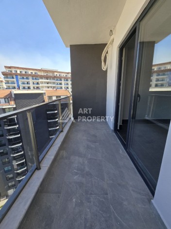 Квартира 1+1 с панорамным видом на горы в Махмутларе, 54 м², 600 м до моря - Ракурс 10