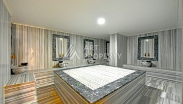 Квартира 1+1 с панорамным видом на горы в Махмутларе, 54 м², 600 м до моря - Ракурс 14