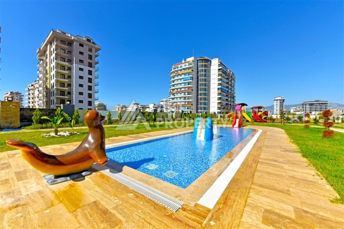 Квартира 1+1 с панорамным видом на горы в Махмутларе, 54 м², 600 м до моря - Ракурс 16