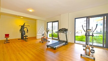 Квартира 1+1 с панорамным видом на горы в Махмутларе, 54 м², 600 м до моря - Ракурс 18