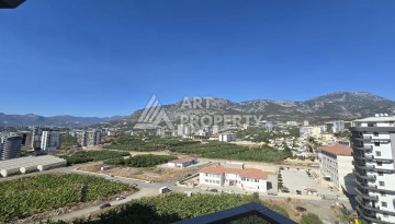 Квартира 1+1 с панорамным видом на горы в Махмутларе, 54 м², 600 м до моря - Ракурс 20