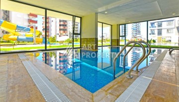 Квартира 1+1 с панорамным видом на горы в Махмутларе, 54 м², 600 м до моря - Ракурс 24