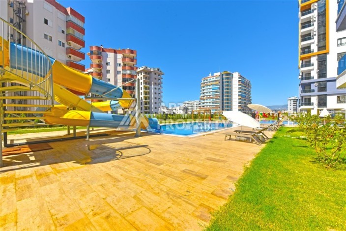 Квартира 1+1 с панорамным видом на горы в Махмутларе, 54 м², 600 м до моря - Ракурс 24