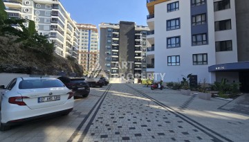 Квартира 1+1 с панорамным видом на горы в Махмутларе, 54 м², 600 м до моря - Ракурс 29