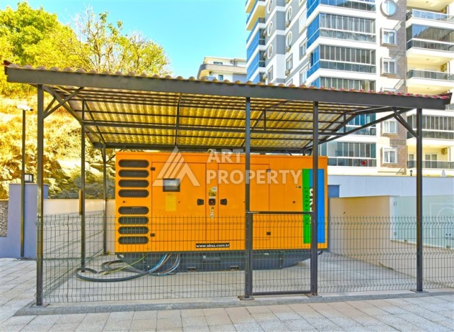 Квартира 1+1 с панорамным видом на горы в Махмутларе, 54 м², 600 м до моря - Ракурс 30