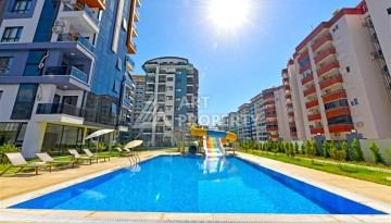 Квартира 1+1 с панорамным видом на горы в Махмутларе, 54 м², 600 м до моря - Ракурс 32